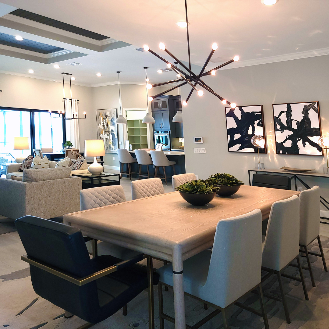 A living room with a modern chandelier